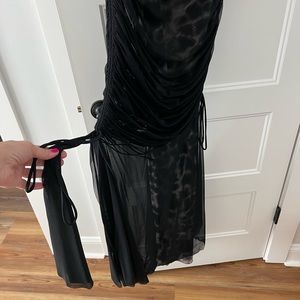 Formal long black and white dress with a fish scale print. Italian designer